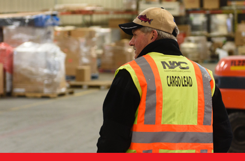 A Northern Air Cargo employee in the warehouse.