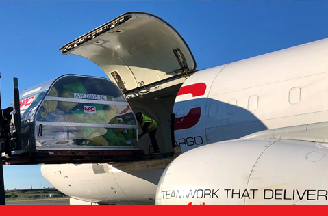 Cargo being loaded into a Northern Air Cargo plane. 